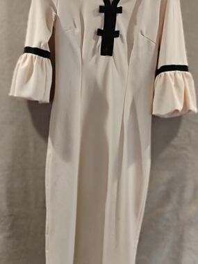 Elegant Cream Sheath Dress with Black Trim